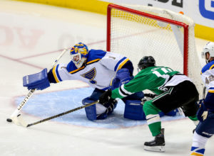 The Dallas Stars' Patrick Sharp (10) goes for the puck against St. Louis Blues goalie Brian Elliott (1) during the second period in Game 5 of the Western Conference semifinals at the American Airlines Center in Dallas on Saturday, May 7, 2016. The Blues won, 4-1, for a 3-2 series lead. (Steve Nurenberg/Fort Worth Star-Telegram/TNS) ORG XMIT: 1184466