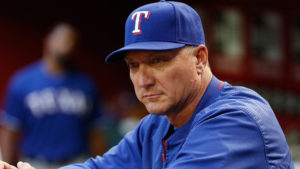 PHOENIX, AZ - APRIL 21:  Manager Jeff Banister #28 of the Texas Rangers watches from the dugout during the MLB game against the Arizona Diamondbacks at Chase Field on April 21, 2015 in Phoenix, Arizona.  (Photo by Christian Petersen/Getty Images)
